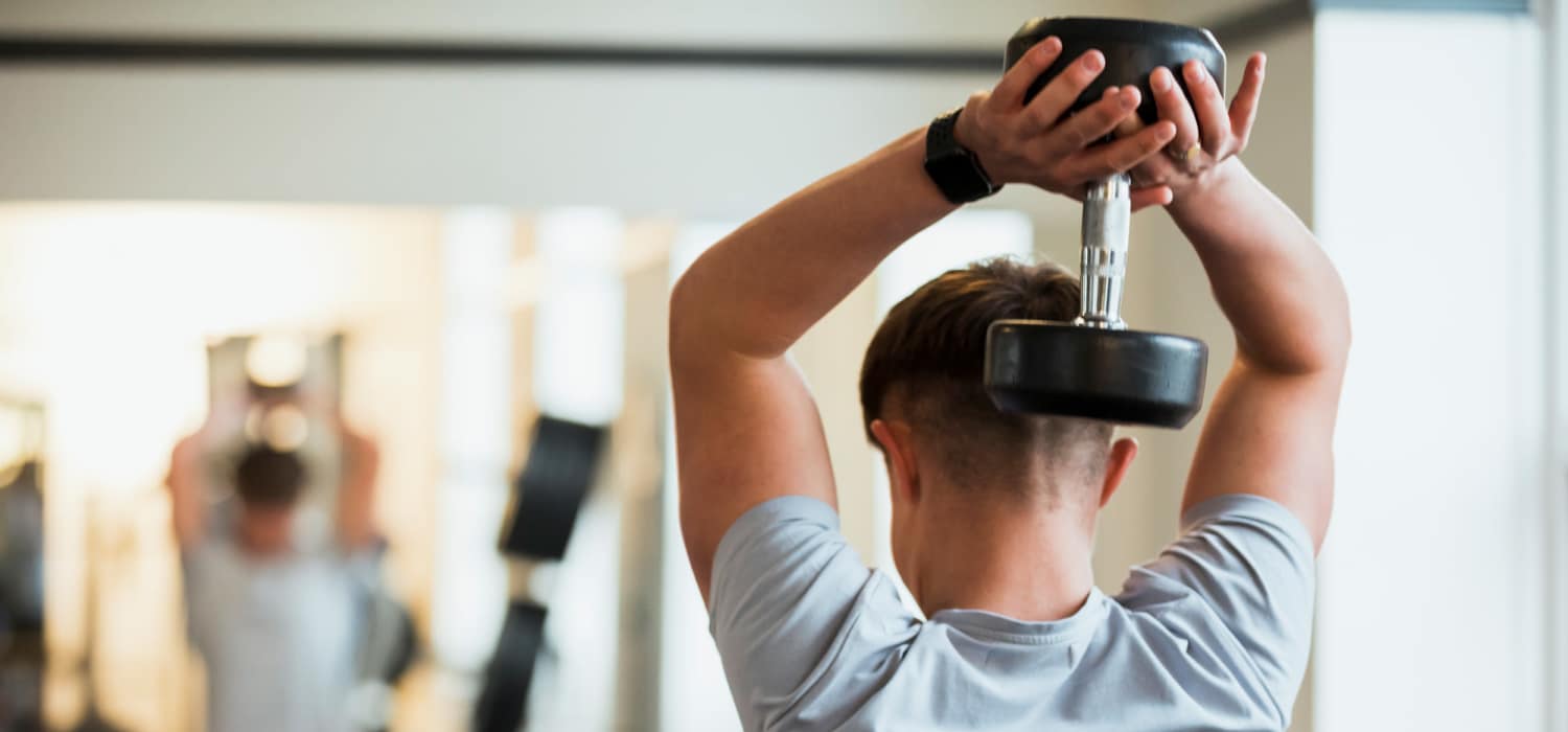A resident working out in the gym at Townsend Trace Apartments in Greensboro, North Carolina