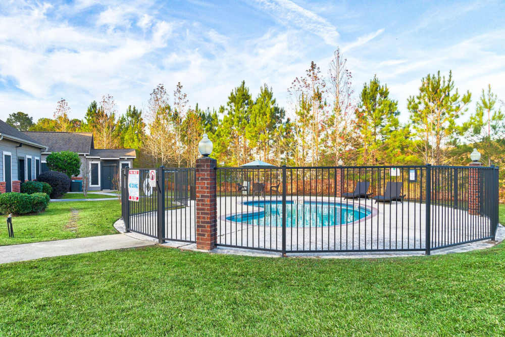 Swimming pool near the clubhouse at Dogwood Terrace Apartments in Woodville, Texas    