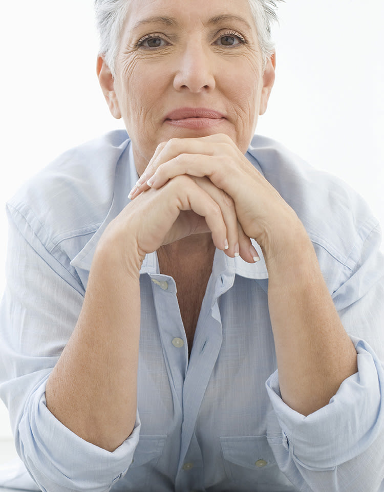 Senior with hands crossed at Citrus Place in Riverside, California