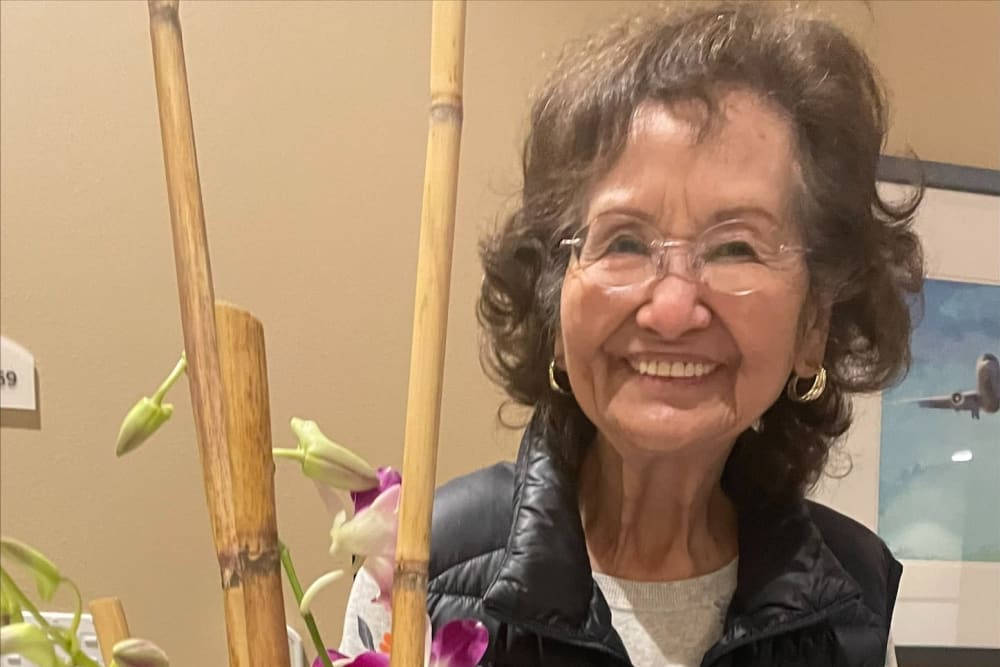 A resident enjoying an event at Merrill Gardens at Renton Centre in Renton, Washington. 