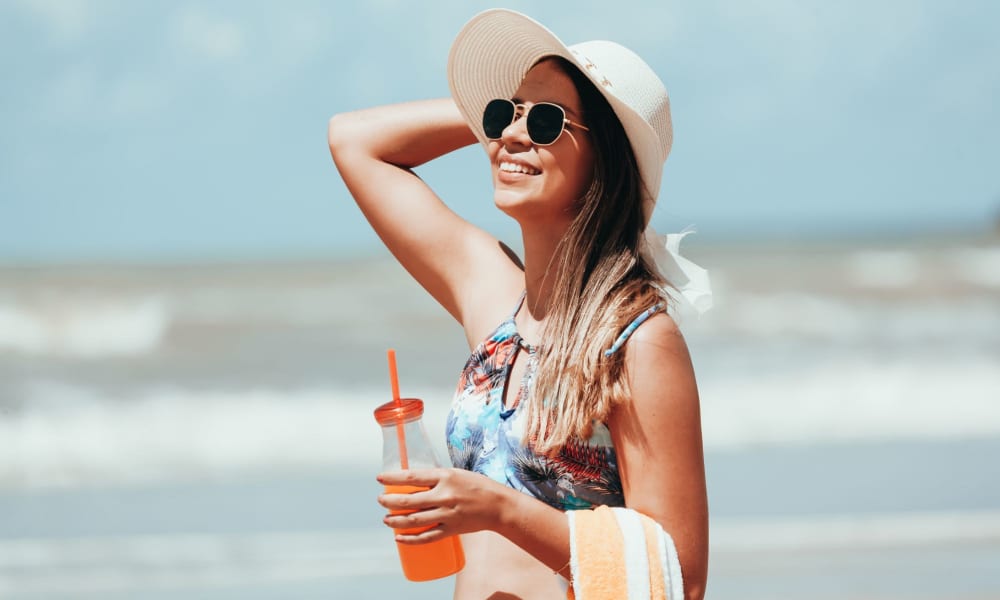 Resident enjoying the beach near The Emory in Pensacola, Florida