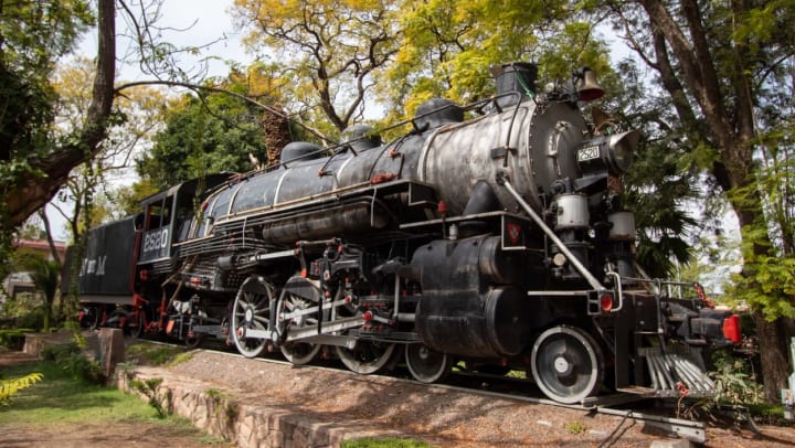 an old train sitting on railroad tracks | top museums to visit in Ooltewah