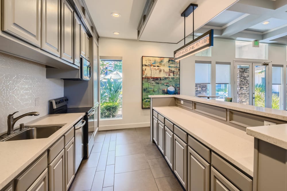 A gathering kitchen in the clubhouse of Alicante Apartment Homes in Aliso Viejo, California