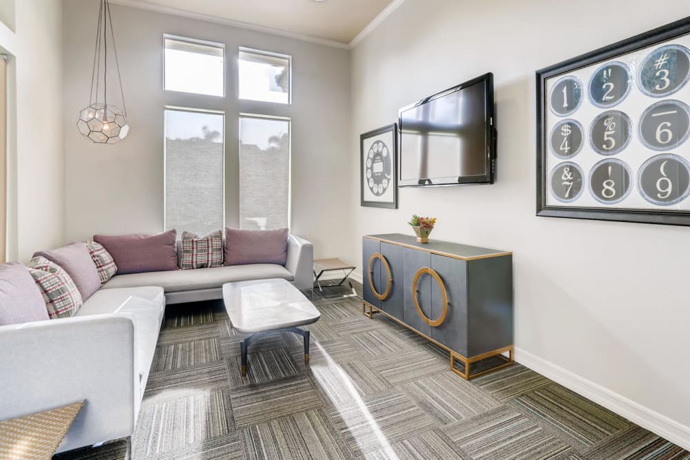 Clubhouse lounge at Alize at Aliso Viejo Apartment Homes in Aliso Viejo, California