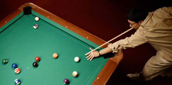 Residents playing billiards near Lodge at Croasdaile Farm in Durham, North Carolina