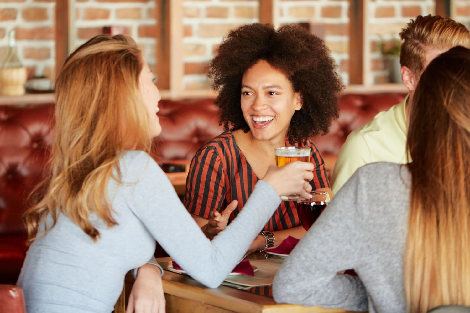Friends meeting up for drinks near Del Corazon Apartments in Santa Rosa, California