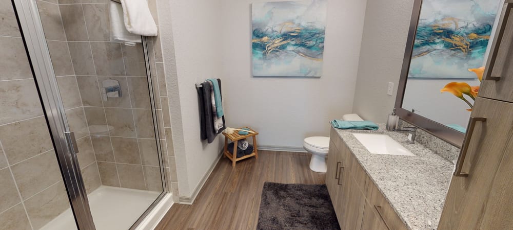 Spacious bathroom with large mirror and ample counter space at Integra 289 Exchange in DeBary, Florida