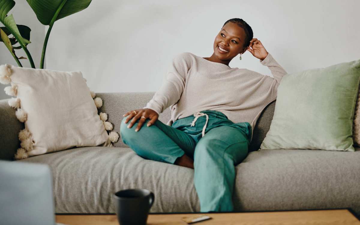 Resident resting in her living room at Devonwood Apartments in Fayetteville, North Carolina