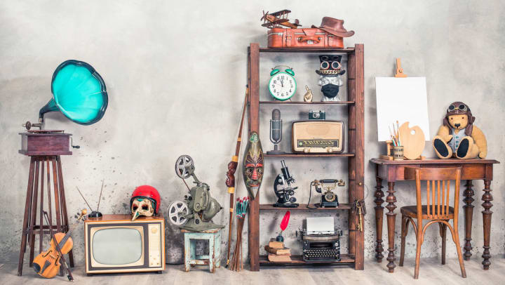 A mix of antiques in front of a concrete wall | Antique Shops in Jacksonville