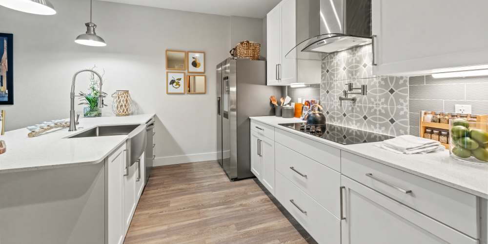 Well-organized fully equipped modern kitchen at Grande Pointe in Orlando, Florida