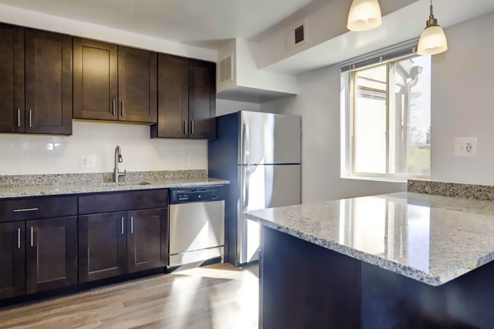 Kitchen with lots of natural light at Marrion Square Apartments in Pikesville, Maryland