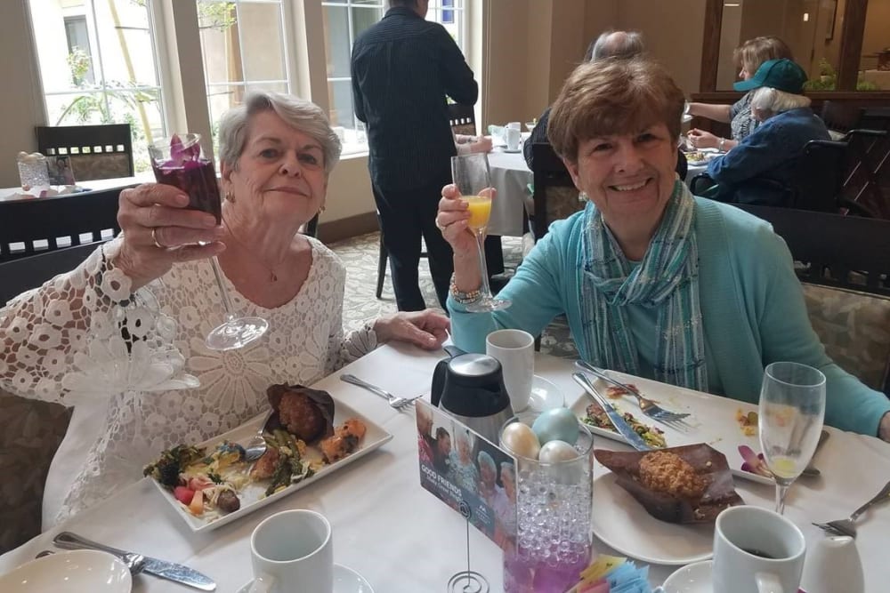 Friends enjoying a champagne brunch at Merrill Gardens at Rancho Cucamonga in Rancho Cucamonga, California. 