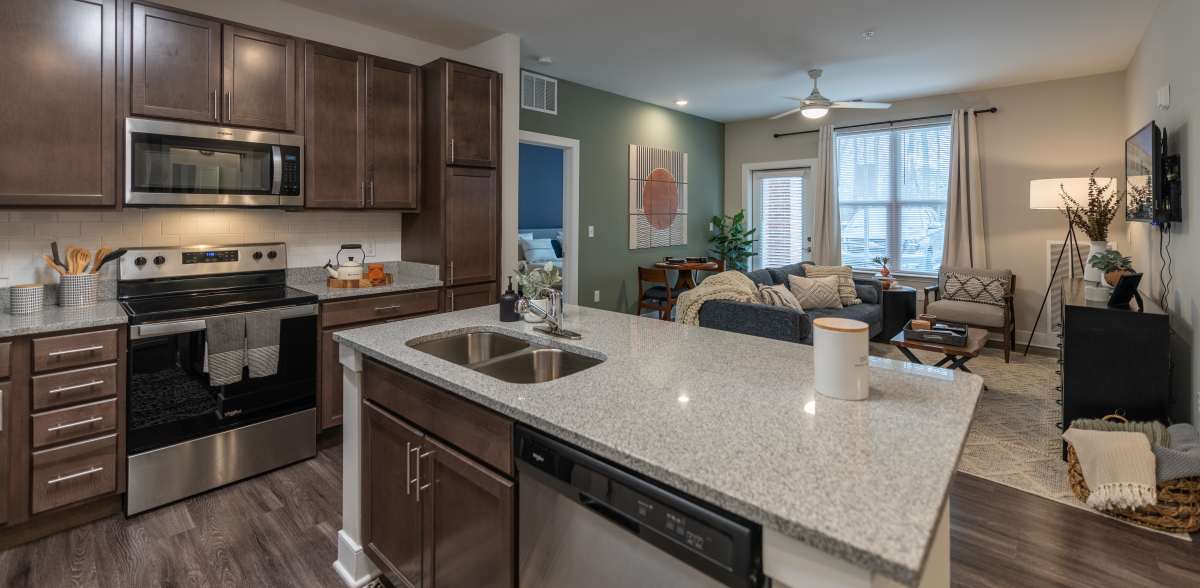 Kitchen with stainless-steel appliances at Attain at Harbour View, Suffolk, Virginia