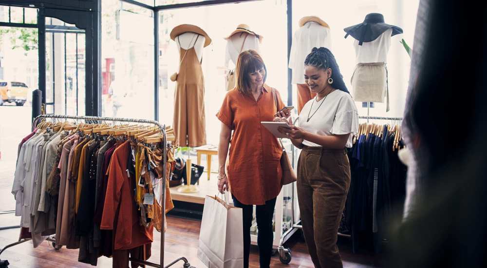 Resident shops for clothes near Henrietta Place in Rochester, New York