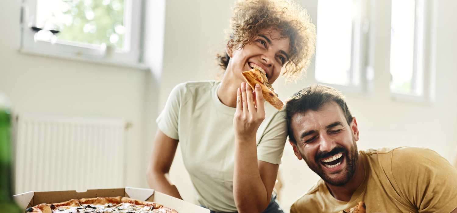 Residents eating pizza at Orchard Point in Sanford, North Carolina