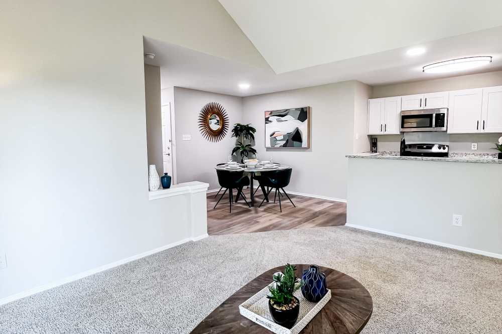 Living, dining, and kitchen areas in a Premium Unit at Residences at Belmont in Fredericksburg, Virginia