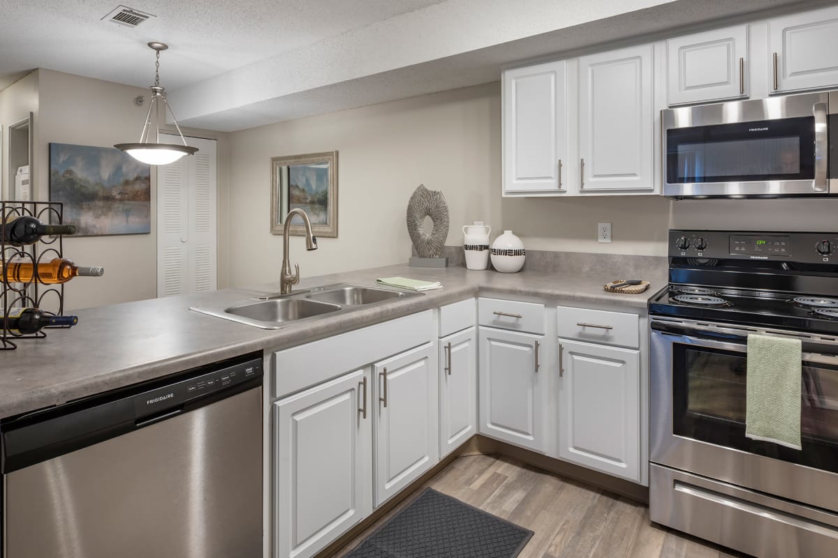 Stainlees-steel appliances in an apartment kitchen at Arlo of Olathe in Olathe, Kansas