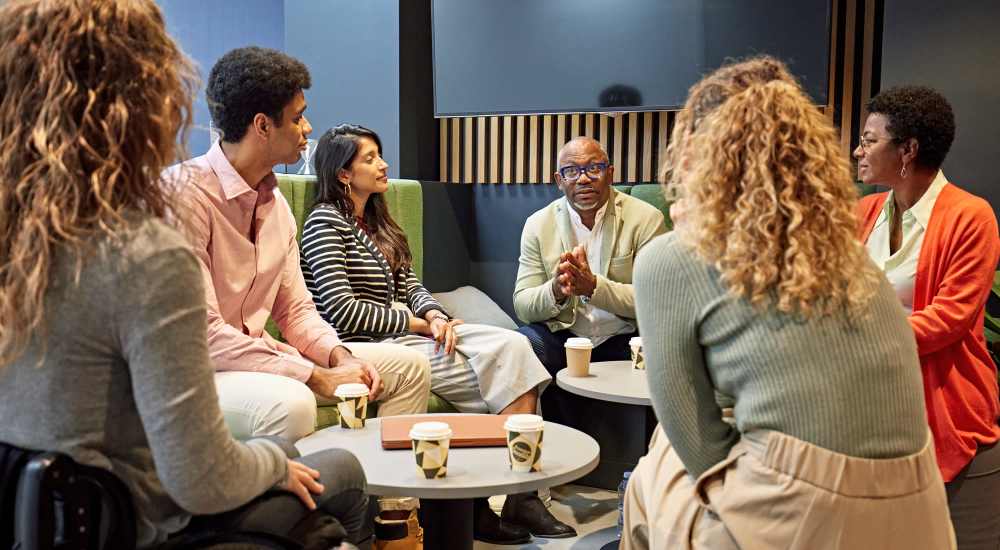 Resident friends seating in cafe near Casa Madrid in Cypress, California