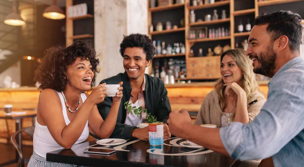 Residents having coffee near The Loop in Conroe, Texas