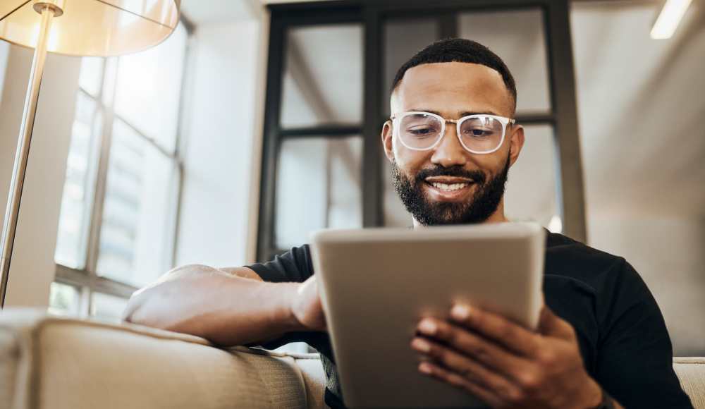 Resident using his ipad at Citron in Omaha, Nebraska
