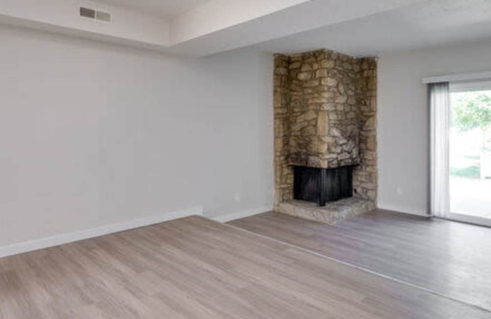 Living room with fireplace in a model home at Maple Oaks in Middletown, Ohio