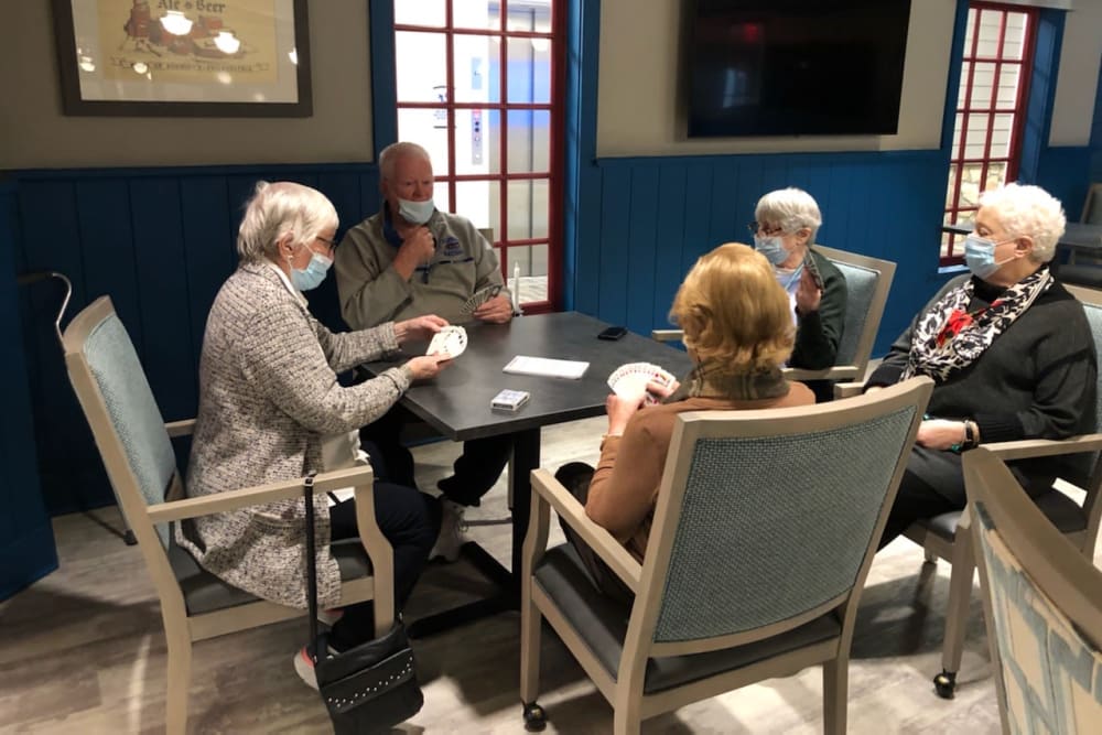 Residents playing cards at Crescent Fields at Huntingdon Valley in Huntingdon Valley, Pennsylvania