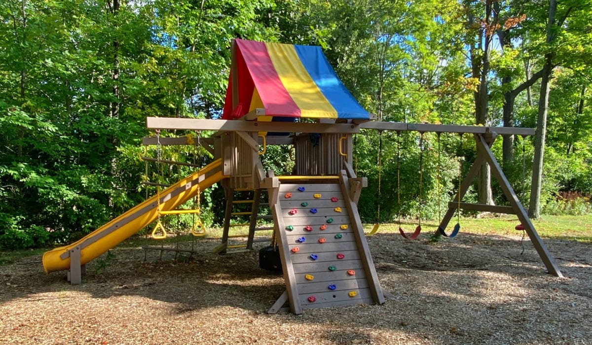 Outdoor playground at Park Lane Apartments in Depew, New York