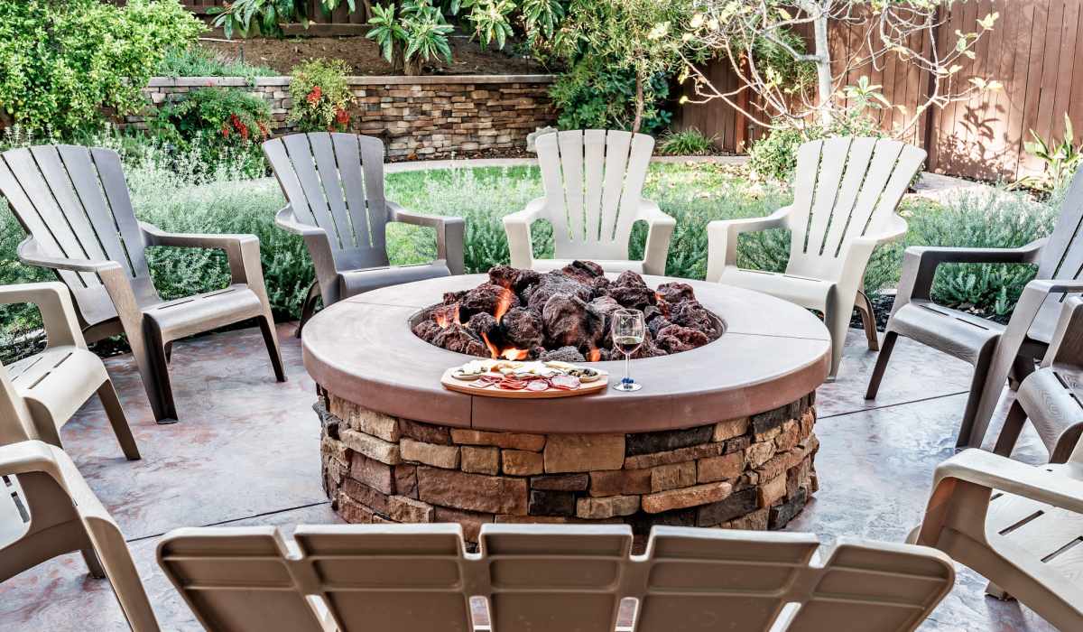 An outdoor patio with a firepit at Autumn Oaks Apartments in Suisun City, California