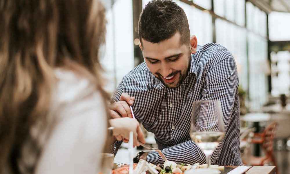 Resident couple dining near Belmont Glen Residences in Belmont, California