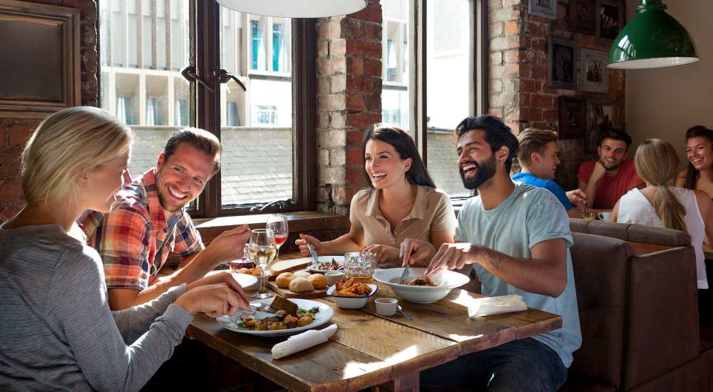 Resident freiends having lunch at restaurant near Glenwood Garden Apartments in Mountain View, California