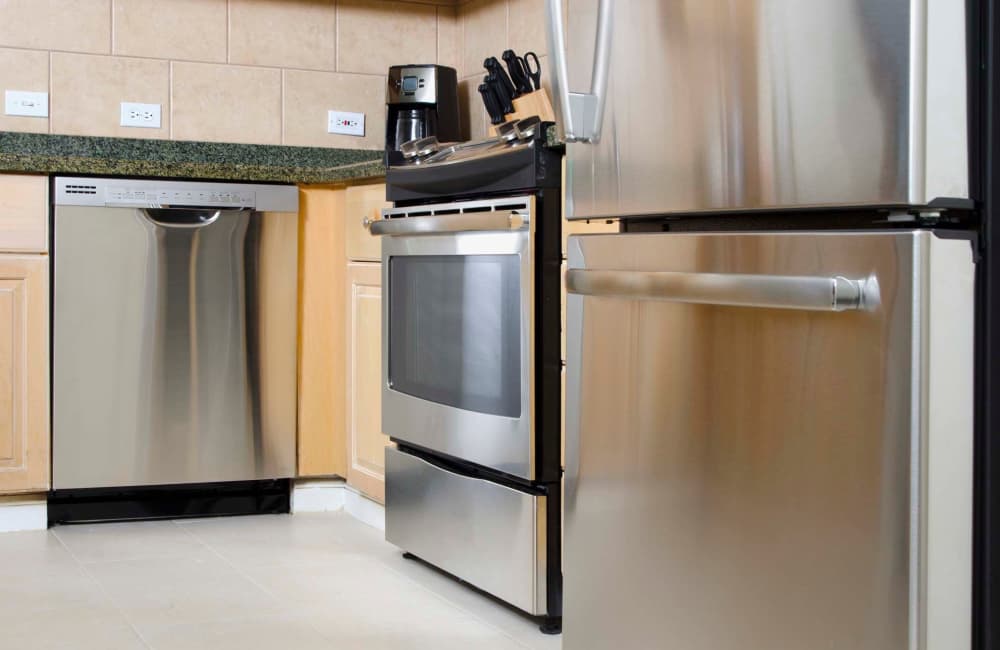Dishwasher in a kitchen of a model apartment at Palm Manor Apartments in McAllen, Texas