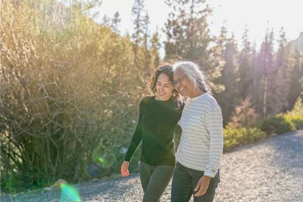 Mother and daughter enjoying a walk outdoors at Clearwater Newport Beach in Newport Beach, California