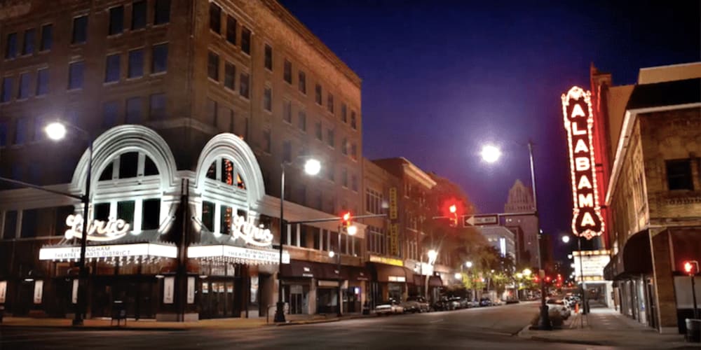 Resident walking on his way home to Theatre Lofts in Birmingham, Alabama