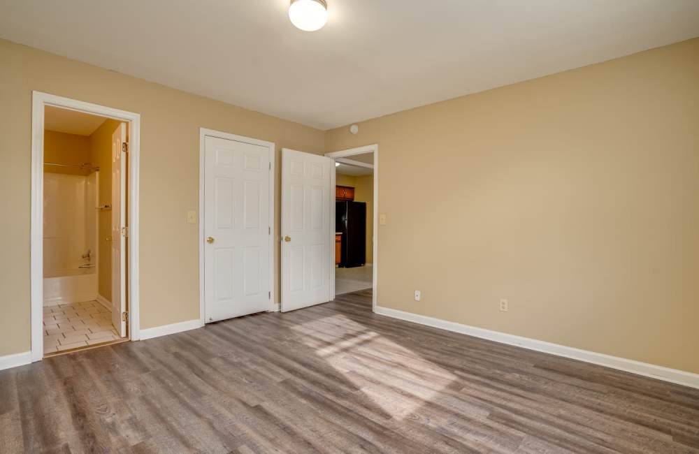 Spacious bedroom for lot of empty space for beds and more at Spring Hill Apartments in Ringgold, Georgia