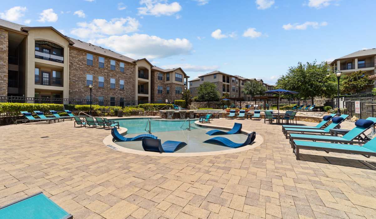 Resort style swimming pool and deck at Lebanon Ridge in Frisco, Texas