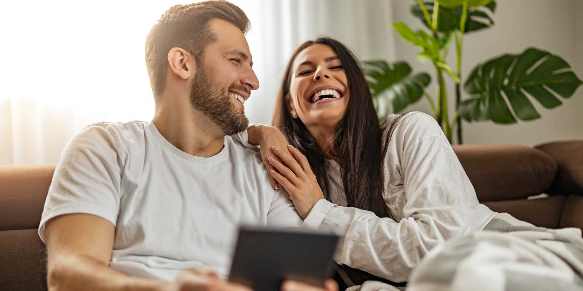 A couple in their apartment at Cameron Oaks Apartment Homes in Cameron Park, California