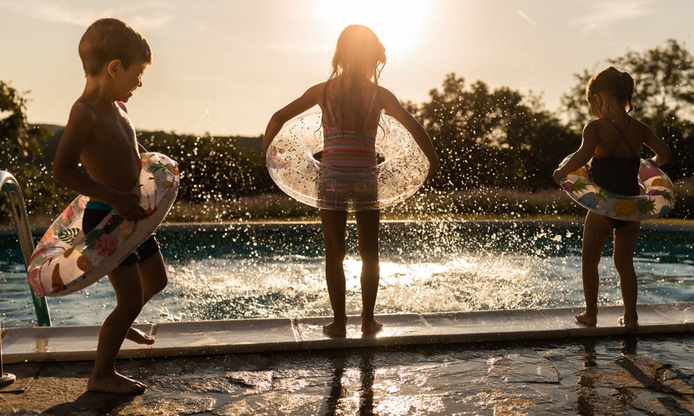 Kids playing by the pool at Steward + Helm in Dallas, Texas
