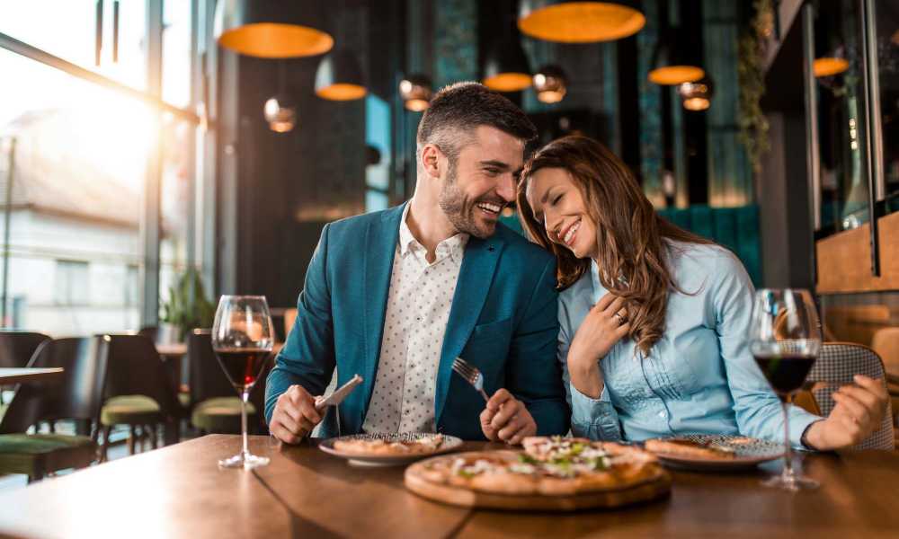 Residents enjoying pizza in a nearby restaurant at Truckee River Terrace in Reno, Nevada