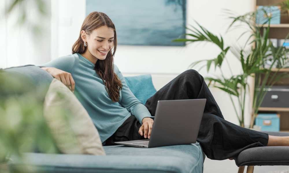 Resident using online service at Canton Overlook in Baltimore, Maryland