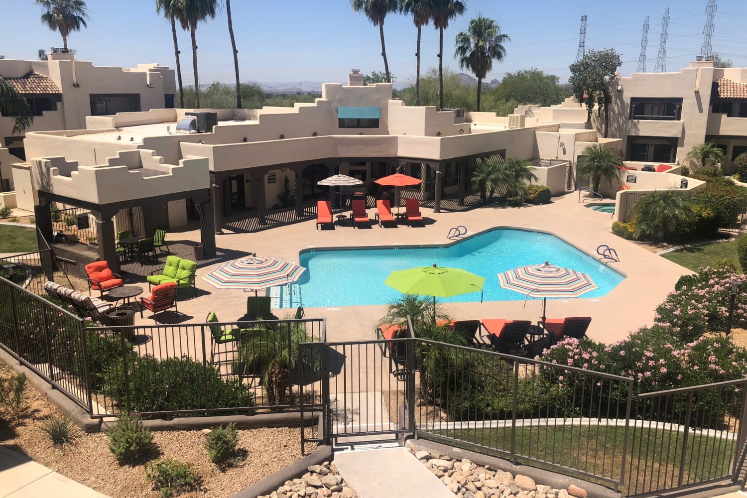 Aerial view of the swimming pool at Casa Santa Fe Apartments in Scottsdale, Arizona