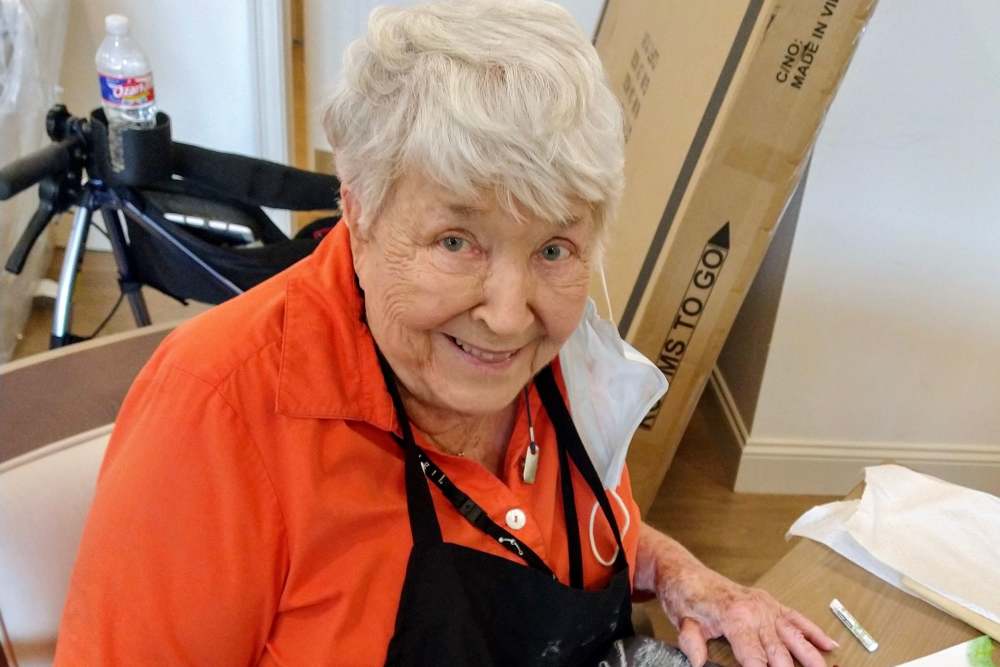 Resident doing arts and crafts at Laurel Grove in Lawrenceville, Georgia