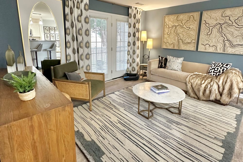 Large master bedroom with plush carpeting at Glade Creek Apartments in Roanoke, Virginia