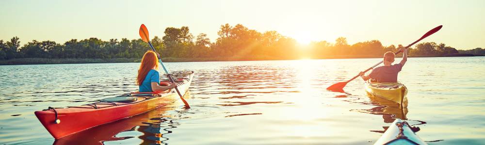 Resident relaxing on the lake at Encore at West Valley in White Lake, Michigan