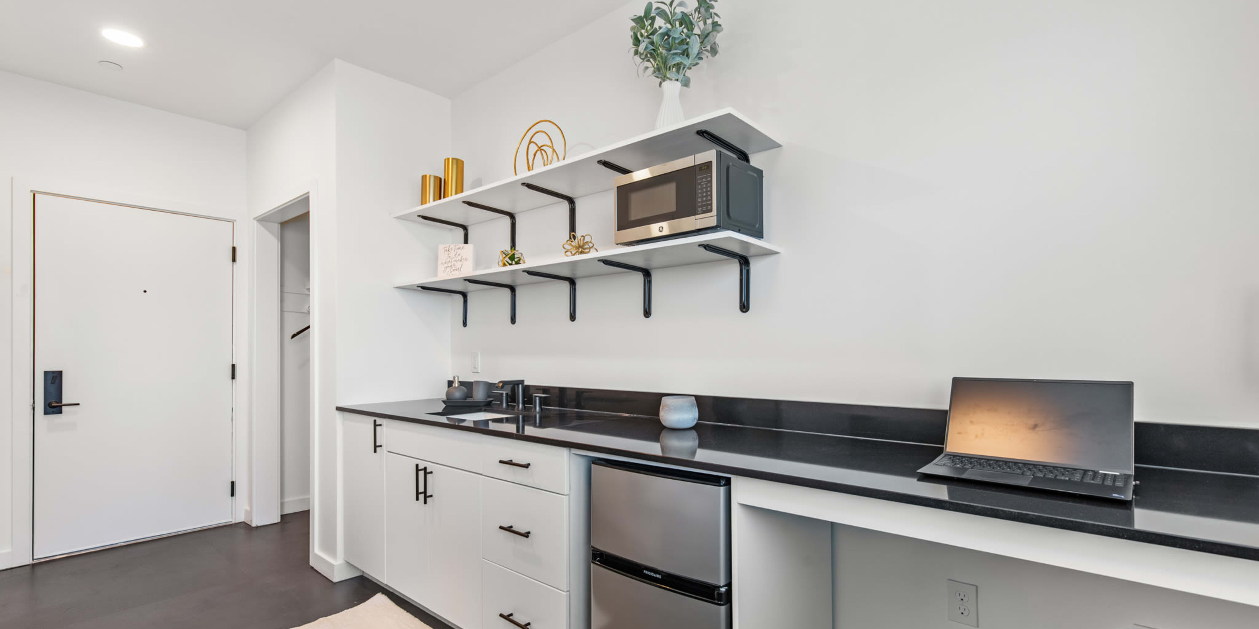 Studio apartment kitchen and working desk at Rutledge Flats | Apartments in Nashville, TN