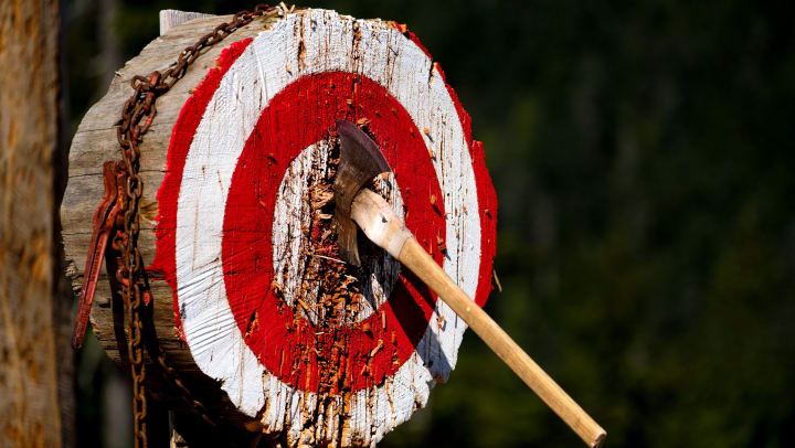 AXE THROWING IS IN 5 TECHNIQUES FOR HITTING A BULLSEYE