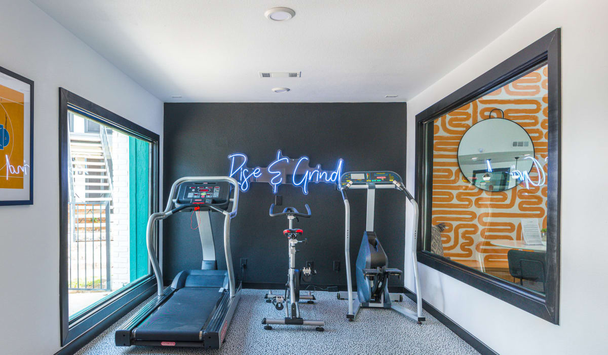 Modern gym at Athena Apartment Homes in Benbrook, Texas