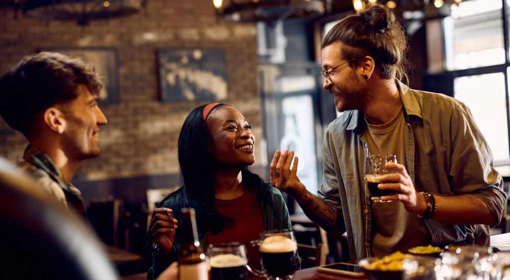 Friends enjoying drinks near Brentwood Apartments in Olympia, Washington