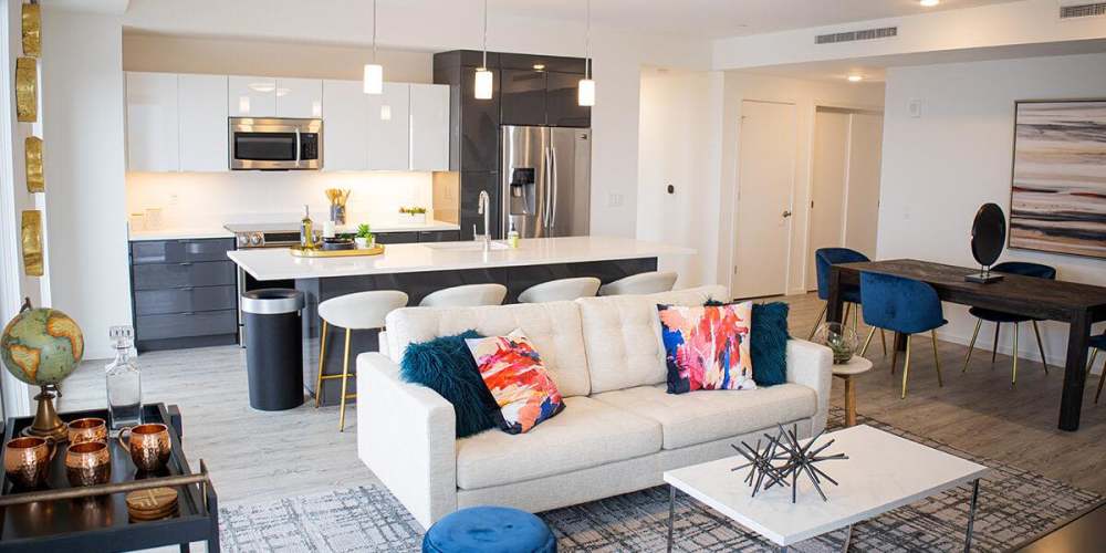 A model apartment living room, dining room and kitchen at The Beacon in Cleveland, Ohio