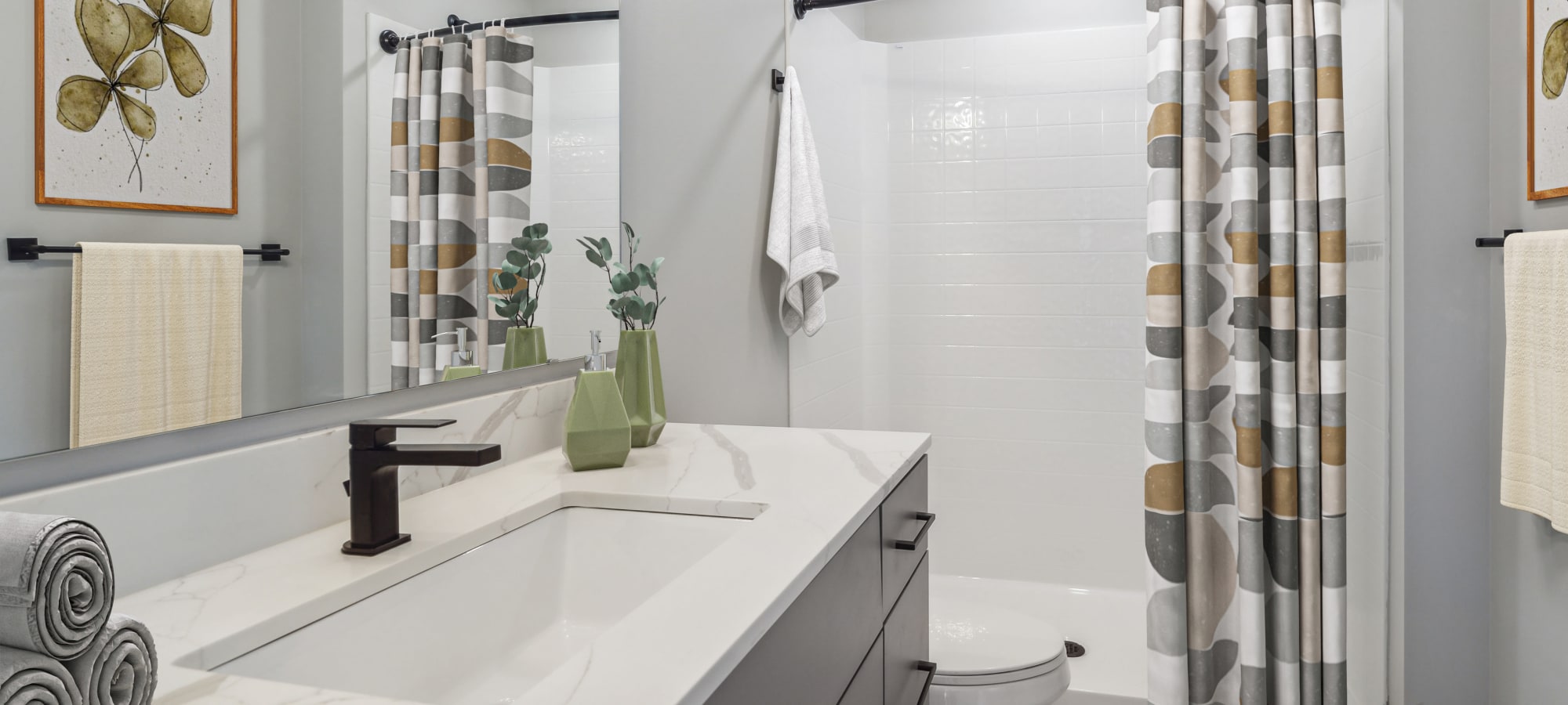 large bathroom with cabinet storage in Marysville, Washington at Alta Crossing