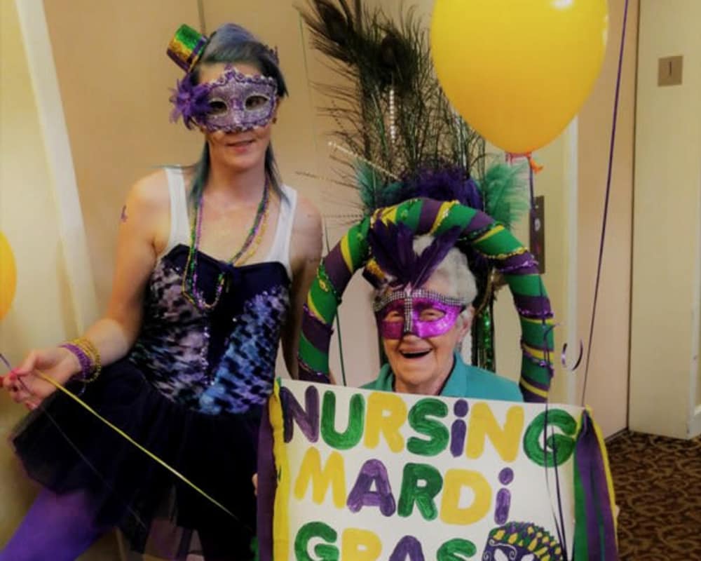 Resident and staff at Hibiscus Court dressed up for Mardi Gras